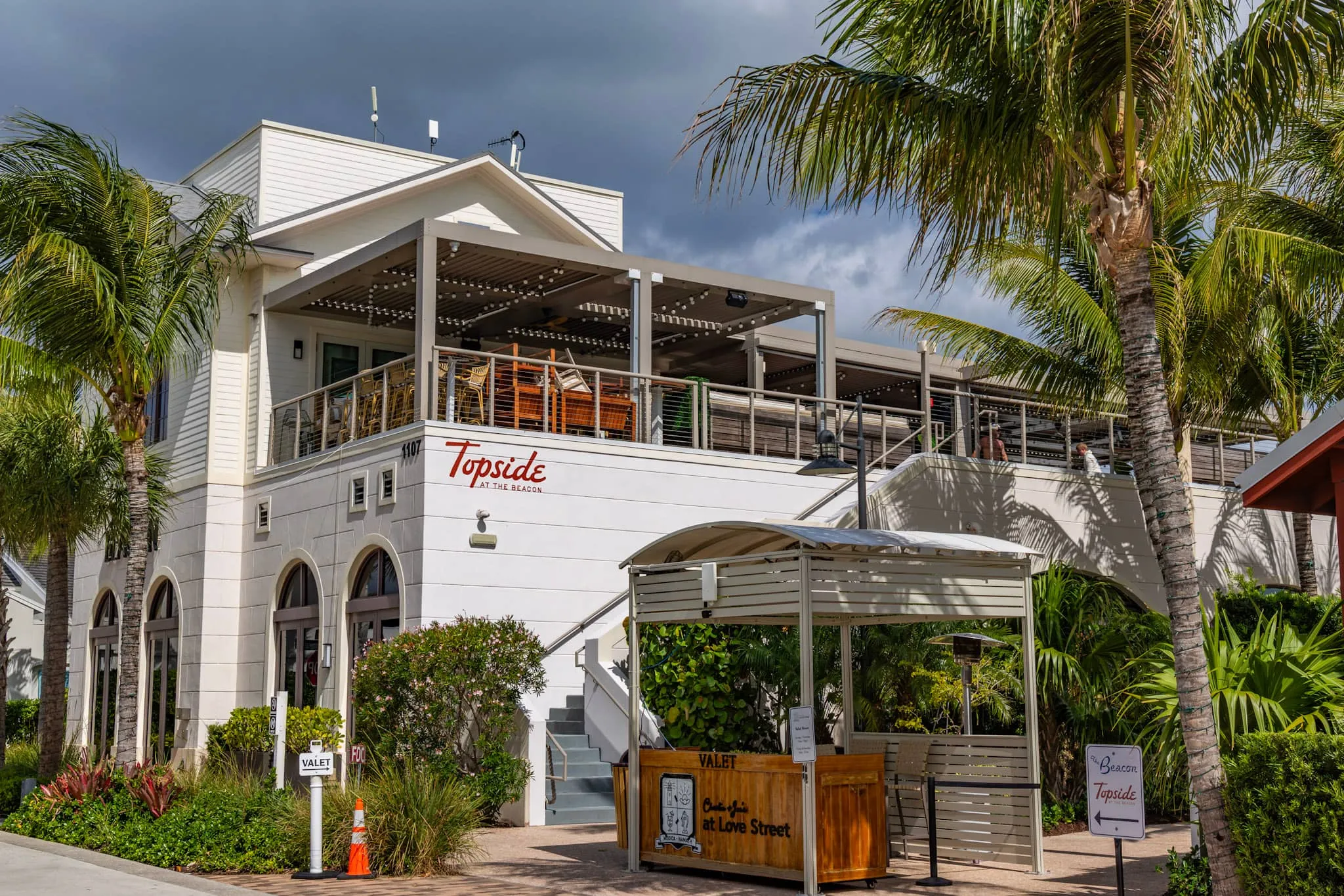 Exterior of a local waterfront restaurant in Jupiter, Florida at golden hour